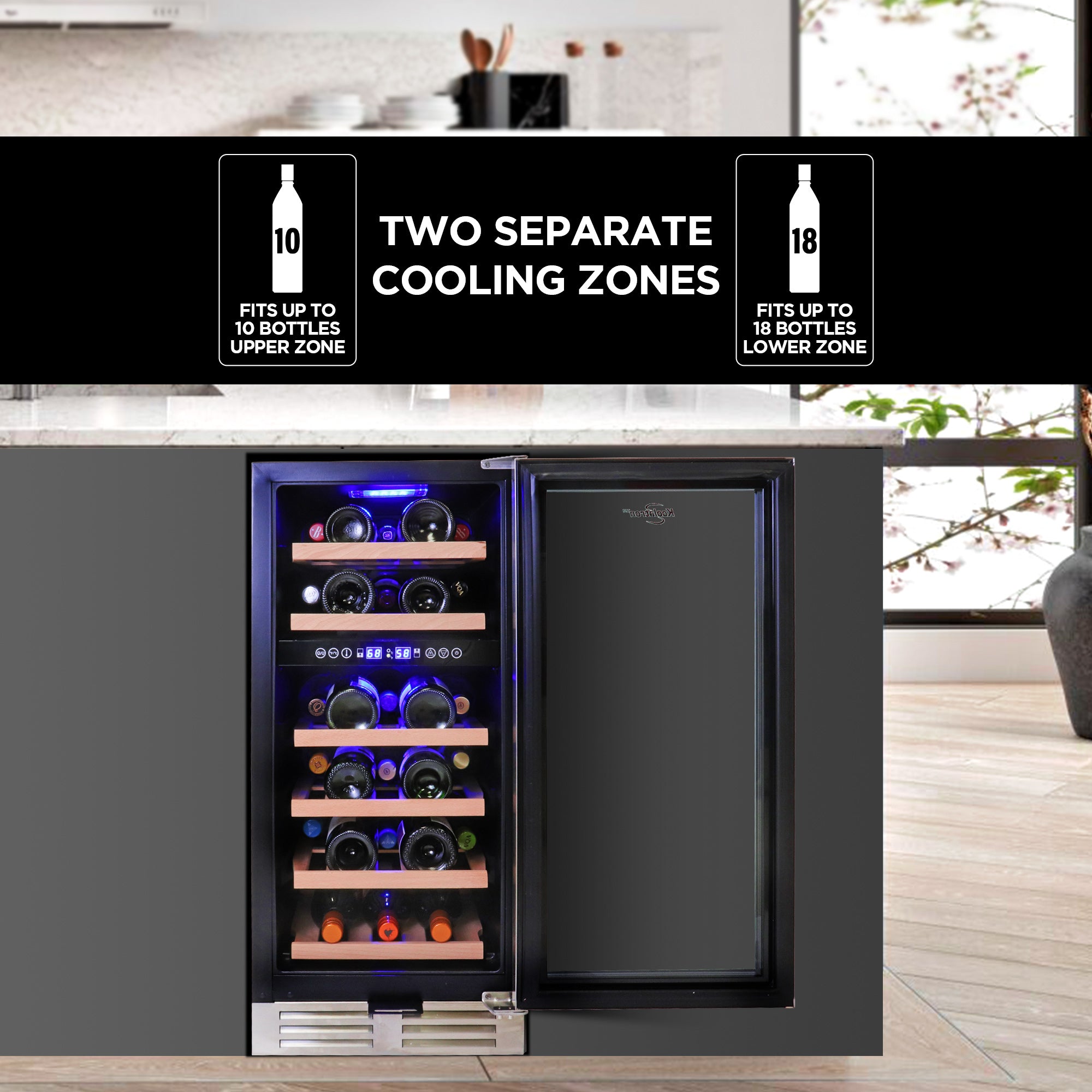 Koolatron 28 bottle compressor wine cooler, open and filled with bottles of wine, installed in a dark gray kitchen island. Text overlay reads, "Two separate cooling zones: Fits up to 10 bottles upper zone; fits up to 18 bottles lower zone"