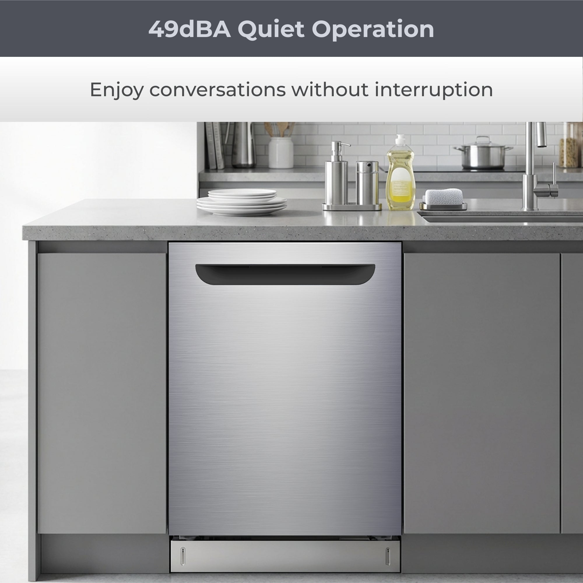Kenmore ultra-quiet 24-inch top control dishwasher installed in a bright kitchen with grey cabinets. Text above reads, "49 dBA Quiet Operation: Enjoy conversations without interruption."