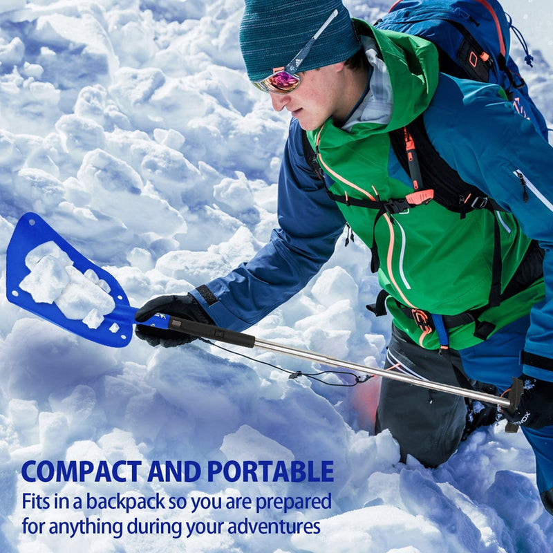 Lifestyle image of a light-skinned person wearing a green and teal winter coat, teal backpack and hat, black gloves, and reflective wraparound sunglasses, standing knee-deep in snow and lifting snow with the emergency shovel. Text overlay at the bottom reads, "Compact and portable: Fits in a backpack so you are prepared for anything during your adventures"