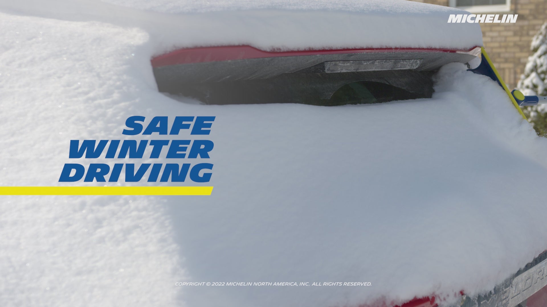 Video shows snow brush being used to clear a thick layer of snow off a red SUV. Text overlay reads, "Safe winter driving begins with visibility"