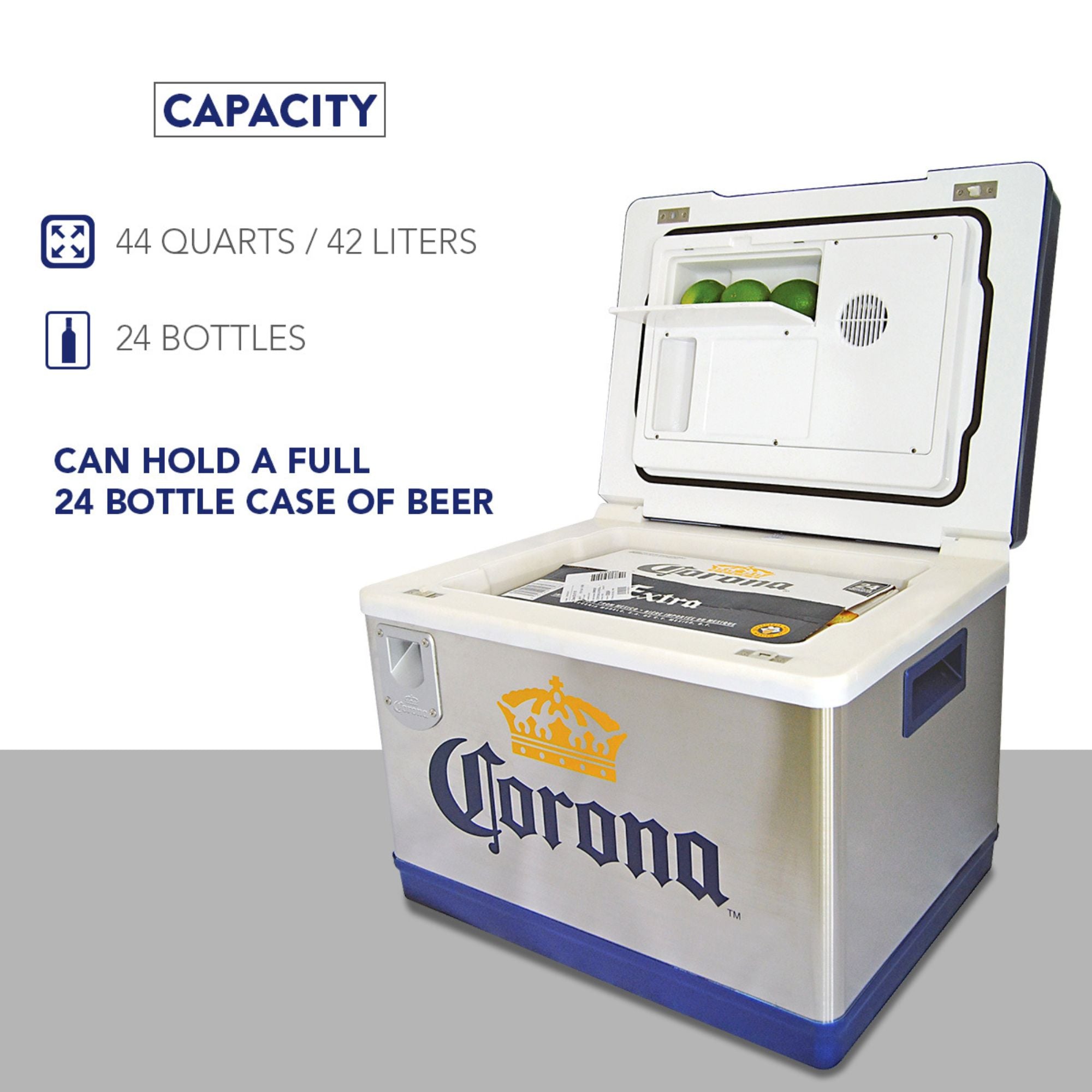 Product shot of the Corona Cruiser thermoelectric travel fridge, open with a case of beer inside and three limes visible in the lime storage compartment, on a white and light gray background. Text reads, "Capacity 44 quarts/42 liters; 24 bottles; Can hold a full 24 bottle case of beer"