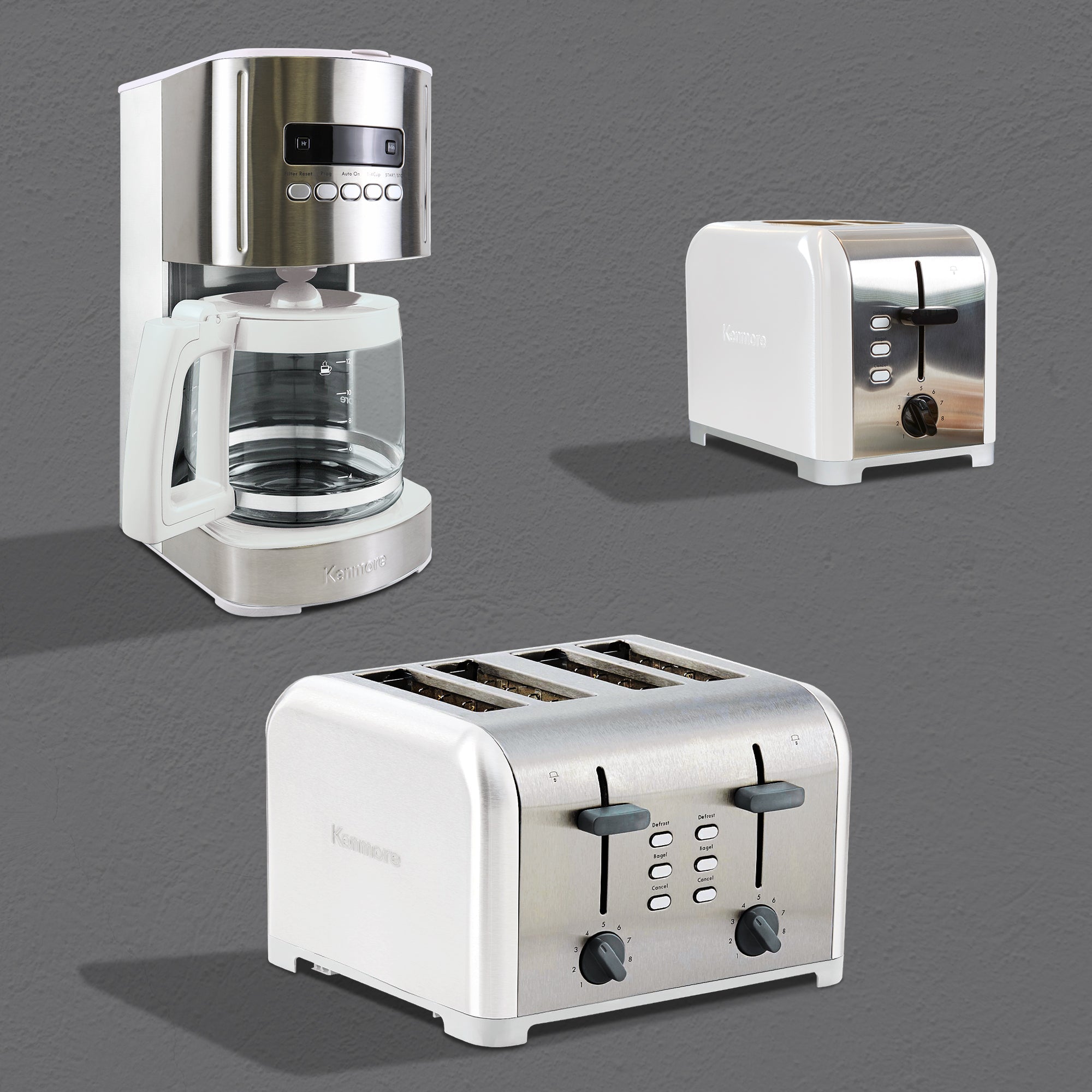 Three product shots on a dark gray background show matching Kenmore small appliances: 12-Cup Programmable Coffee Maker; 2-Slice Toaster; 4-Slice Toaster with Dual Controls