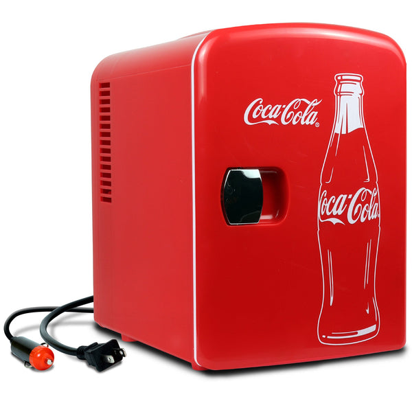 Product shot of Coca-Cola Classic Bottle 4L mini fridge, closed, with AC and DC power cords visible, on a white background