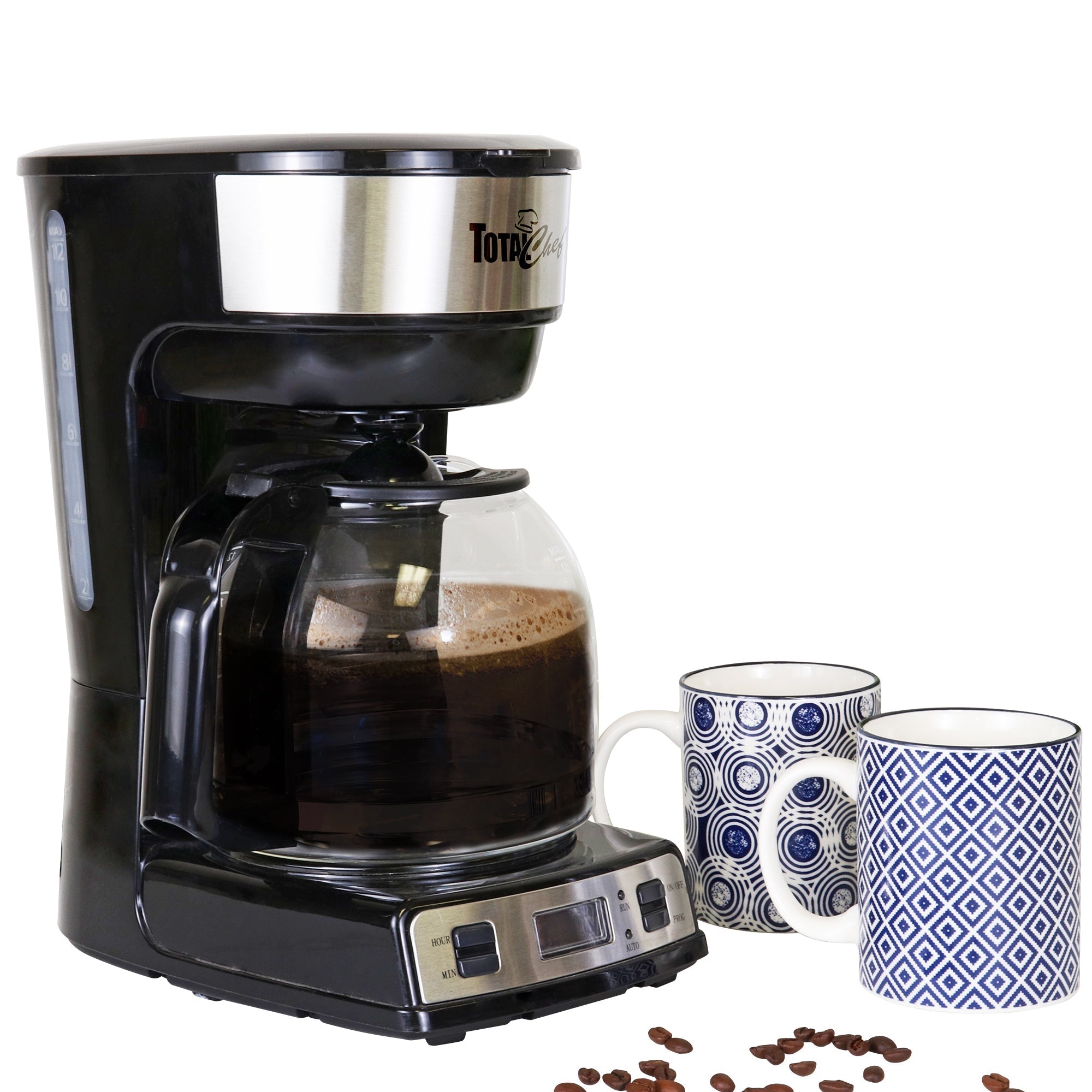 Product shot of coffeemaker with brewed coffee in it and two blue and white mugs beside on a white background