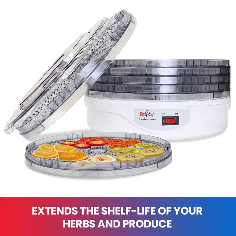 Product shot of food dehydrator on white background with lid leaning against it and one tray sliced fruits in front of it. Text below reads "Extends the shelf-life of your herbs and produce"