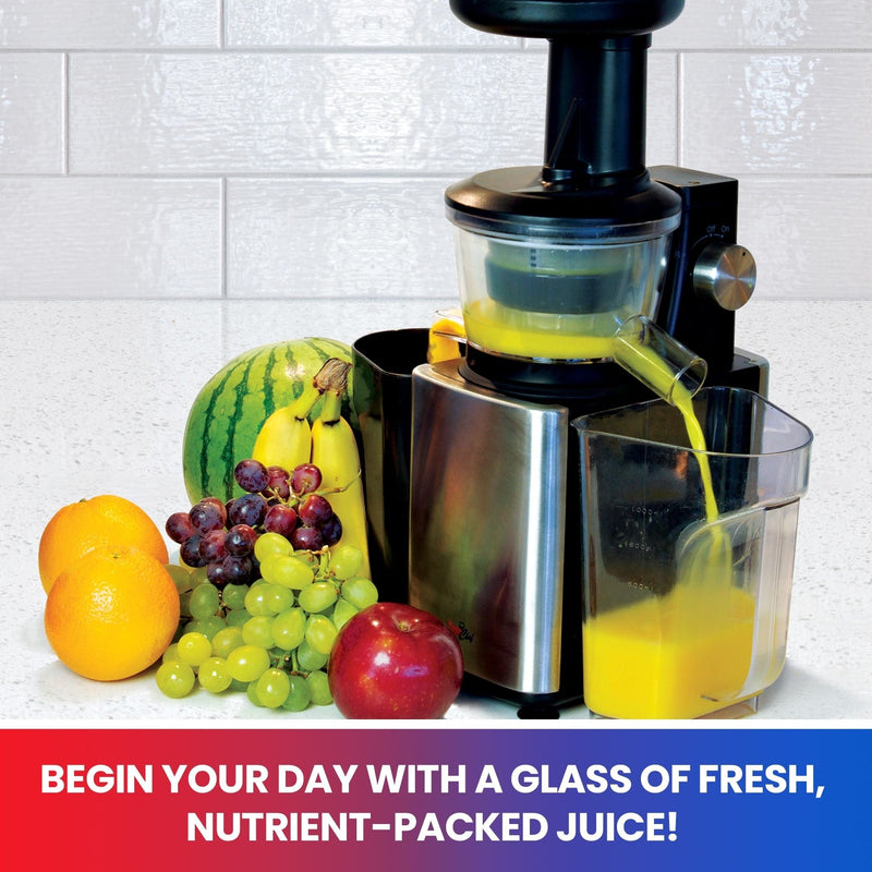 Lifestyle image of slow juicer in use surrounded by fruits on a white counter in front of a light grey tile backsplash. Text below reads "Begin your day with a glass of fresh, nutrient-packed juice!"