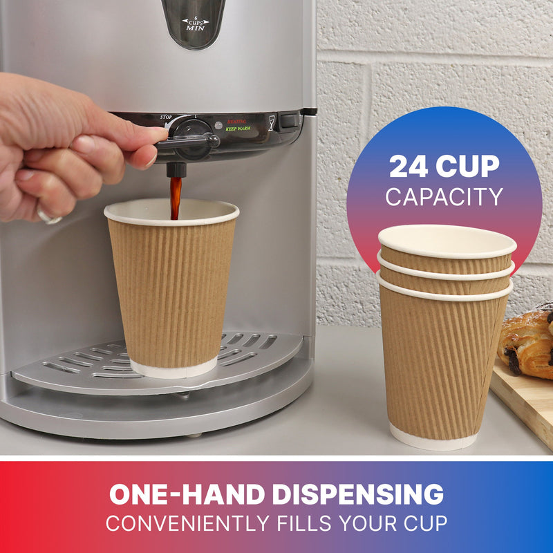 Lifestyle image of a person's hand turning the dial to dispense coffee into a brown paper coffee cup. There is a stack of paper coffee cups to the right with text above the cups reading, "24 cup capacity." Text below the image reads, "One-hand dispensing conveniently fills your cup"